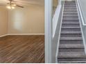 Living room features luxury vinyl plank flooring adjacent to carpeted stairway at 7250 Old Chapel, Atlanta, GA 30349