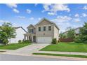 Lovely two-story home featuring a lush green lawn, double garage, and inviting curb appeal at 4020 Huron Dr, Cumming, GA 30028