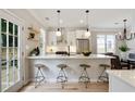 Well-appointed kitchen boasting stainless steel appliances, a breakfast bar, and sleek countertops at 683 Terry Se St, Atlanta, GA 30315