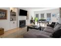 Bright living room with hardwood floors, fireplace, and comfortable seating area at 907 Edgewood Ave Ne, Atlanta, GA 30307