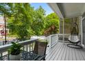 Relaxing porch with comfortable seating and scenic neighborhood views at 907 Edgewood Ave Ne, Atlanta, GA 30307