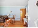 Inviting living room with hardwood floors, light blue walls, and classic decor at 701 Rosedale Se Dr, Smyrna, GA 30082