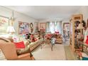 Cozy living room with plush seating, decorative accents, and ample natural light at 850 John Alden Rd, Stone Mountain, GA 30083