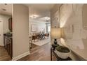 Stylish hallway leading to a bright living area, showcasing modern lighting and elegant decor at 325 E Paces Ferry Ne Rd # 410, Atlanta, GA 30305