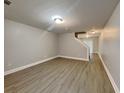 Spacious living room features hardwood floors, recessed lighting, and access to the backyard at 1232 Pinedale Nw Cir, Conyers, GA 30012
