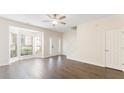 Spacious living room featuring hardwood floors, bay window and natural light at 2727 Parkway Trl, Lithonia, GA 30058