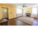 Bright living room with hardwood floors, fireplace and neutral color scheme at 1268 Thomas Rd, Decatur, GA 30030