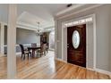 Inviting entryway features hardwood floors, a stylish front door, and elegant trim at 1901 Paper Birch Cv, Grayson, GA 30017