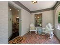 Cozy front porch showcasing stylish tile flooring, rocking chairs, and a welcoming entrance at 1748 N Pelham Ne Rd, Atlanta, GA 30324