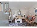 Bright living room with elegant furnishings, rug, and stylish decor at 1748 N Pelham Ne Rd, Atlanta, GA 30324