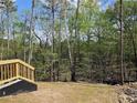 Backyard with deck and trees at 195 Silvercrest Dr, Acworth, GA 30101