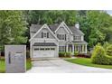 Attractive two-story home with well-maintained landscaping and a two-car garage at 2585 Drew Valley Ne Rd, Brookhaven, GA 30319