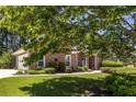Well-maintained brick home with a side-entry garage and attractive landscaping at 3845 Glen Ian Dr, Loganville, GA 30052