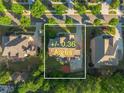 Aerial view of property showing +/- 0.36 acres in a neighborhood setting at 2604 Heltonwood Ct, Buford, GA 30519