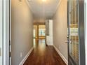 Bright entryway with hardwood floors leading to open living spaces at 2141 Spikerush Way, Buford, GA 30519