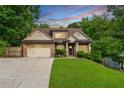 Charming home with manicured lawn and two-car garage, nestled in a tranquil neighborhood at 1556 Gaylor Se Dr, Smyrna, GA 30082