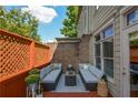 Cozy back porch with comfortable seating, perfect for outdoor relaxation at 661 Lockton Pl, Sandy Springs, GA 30342