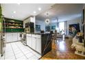 Open-concept living space featuring a stylish kitchen, dining area, and a well-lit living room at 130 26Th Nw St # 701, Atlanta, GA 30309