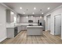 Modern kitchen featuring stainless steel appliances and a center island at 272 Broadstone Blvd, Acworth, GA 30101