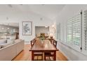 Dining area with hardwood floors, white walls, and ample natural light at 1448 Diamond Head Cir, Decatur, GA 30033