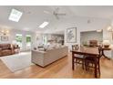 Bright and airy living room with hardwood floors, skylights, and an open layout at 1448 Diamond Head Cir, Decatur, GA 30033