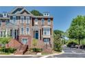 Inviting exterior featuring well-kept landscaping, brick facade, and a secure gated entrance at 2325 Limehurst Ne Dr, Atlanta, GA 30319