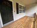 Front door with wooden deck at 80 Brooks Ln, Dallas, GA 30157