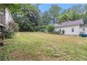 Expansive backyard showcasing a large grassy area, perfect for outdoor activities and entertaining at 1052 Curran Nw St, Atlanta, GA 30318