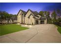 Beautiful two-story home with a spacious driveway and well-manicured lawn at 2631 Sardis Way, Buford, GA 30519