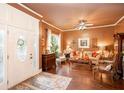 Cozy living room featuring hardwood floors, neutral furniture, and ample natural light at 791 E Main Street, Canton, GA 30114