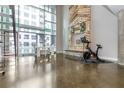 Bright living space featuring high ceilings, large windows, and a modern interior at 845 Spring Street Northwest Nw St # 307, Atlanta, GA 30308