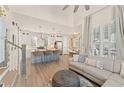 Open-concept living space boasts modern kitchen, inviting living room area, and stylish finishes at 1907 Galt, Kennesaw, GA 30144