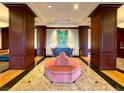 Elegant lobby with decorative seating, marble floors, and stylish artwork at 195 14Th St # 902, Atlanta, GA 30309