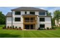Beautiful home with a covered deck, walkout basement, large yard, and manicured landscaping at 2868 Octavia Cir, Marietta, GA 30062