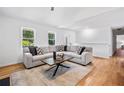 Inviting living area with lots of natural light, hardwood floors and comfortable seating at 1080 Rackley Nw Way, Kennesaw, GA 30144