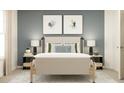 Comfortable bedroom with neutral tones, complemented by stylish lamps and soft carpet at 255 Deer Valley Run, Canton, GA 30115