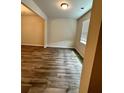 Bright living room with hardwood floors and large window at 2832 Saratoga Lake Vw, Decatur, GA 30034