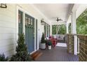 Inviting front porch with comfortable seating and stylish ceiling fan at 1297 Conway Rd, Decatur, GA 30030