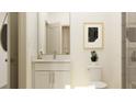 Bright bathroom featuring white cabinets, modern sink, toilet, shower, and stylish decor at 416 Valley View Trl, Canton, GA 30115