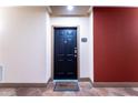 Front door of a condo with unit number and welcome mat at 390 17Th Nw St # 2040, Atlanta, GA 30363