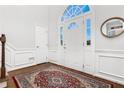 Bright foyer featuring hardwood floors, a white front door and classic trim at 310 Medridge Dr, Alpharetta, GA 30022
