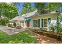 Charming home featuring classic architecture, lush landscaping, and a serene outdoor setting at 2682 Varner Dr, Atlanta, GA 30345
