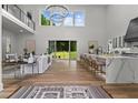 Bright open floor plan with a kitchen island and sliding doors to the backyard at 1604 Greendale Rd, Covington, GA 30014