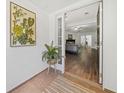 Inviting foyer showcasing the home's open floor plan and hardwood floors at 4941 Lighthouse Pointe, Acworth, GA 30101