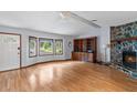 Spacious living room with hardwood floors, bay window, fireplace and vaulted ceiling at 1757 Mystery Sw Cir, Conyers, GA 30094