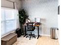 Inviting office space with a large window for lots of light, neutral colors, and a modern design at 800 Peachtree Ne St # 1319, Atlanta, GA 30308