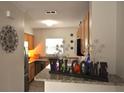 Inviting kitchen featuring granite countertops, stainless steel appliances, and warm wood cabinetry at 1332 Euclid Ave # C, Atlanta, GA 30307