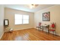 A beautiful living room with hardwood floors, bright windows, and vintage decor accents at 1332 Euclid Ave # C, Atlanta, GA 30307