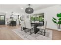 Open floorplan featuring an eat-in kitchen and dining area with a sliding glass door to a screened patio at 3337 Toney Dr, Decatur, GA 30032