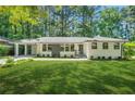 Beautiful renovated ranch offers new paint, manicured lawn, & mature shade trees at 3337 Toney Dr, Decatur, GA 30032